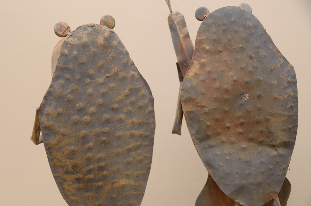 Trio of Metal Frog Musicians