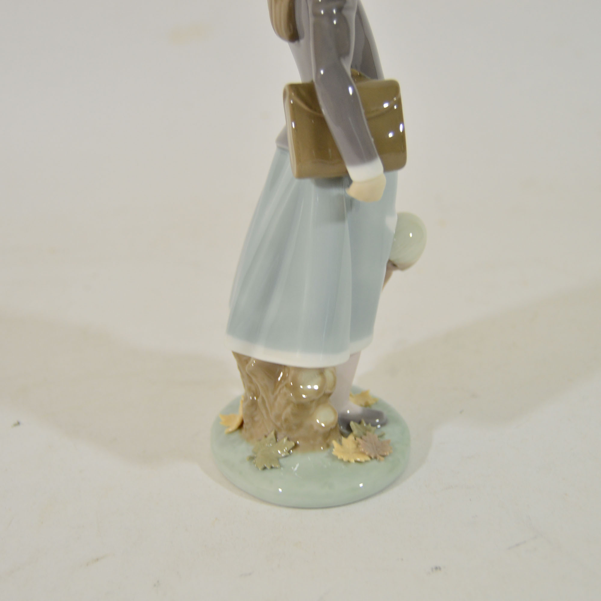 Retired Lladro "School Girl with Doll" Figurine