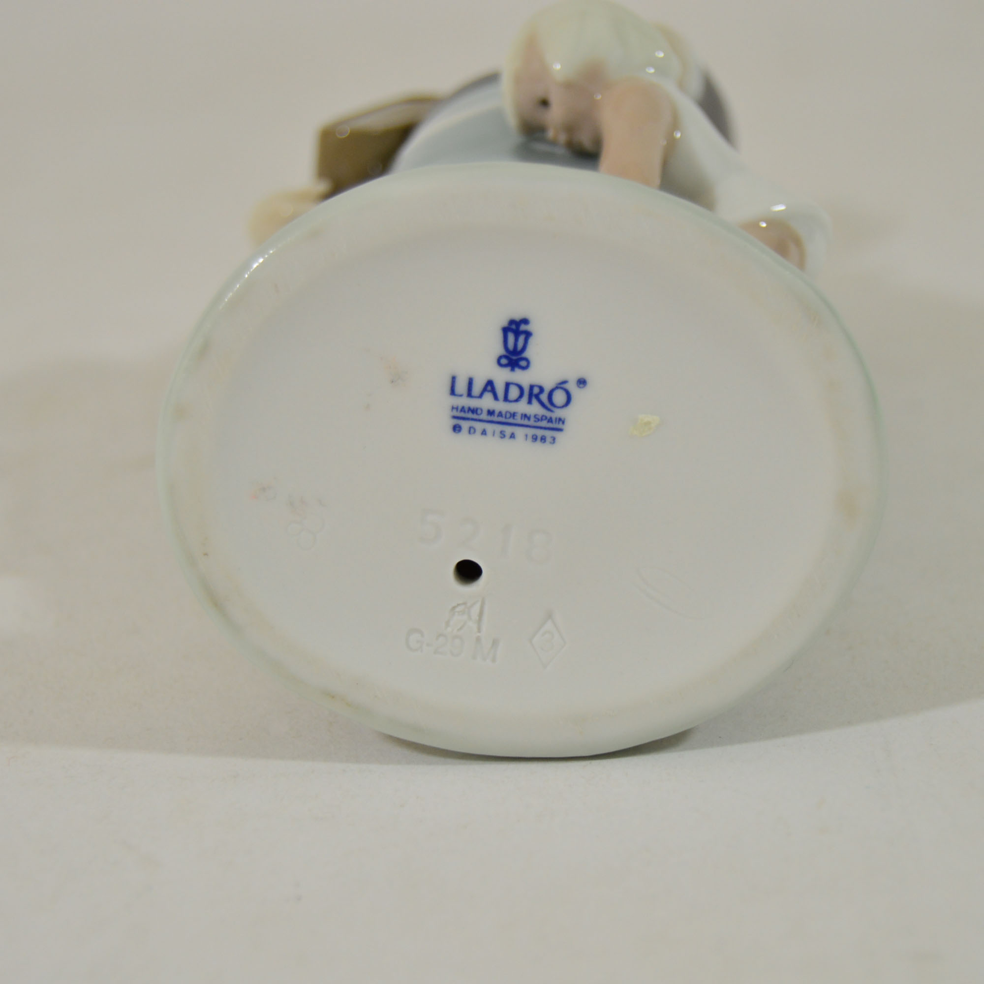 Retired Lladro "School Girl with Doll" Figurine