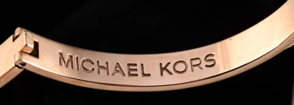 Michael Kors Hinge Buckle Designer Bracelet in a Rose Goldtone Finish