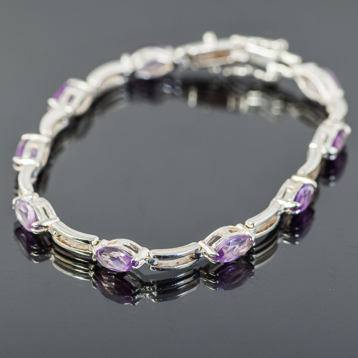 Sterling Silver and Faceted Purple Stone Bracelet