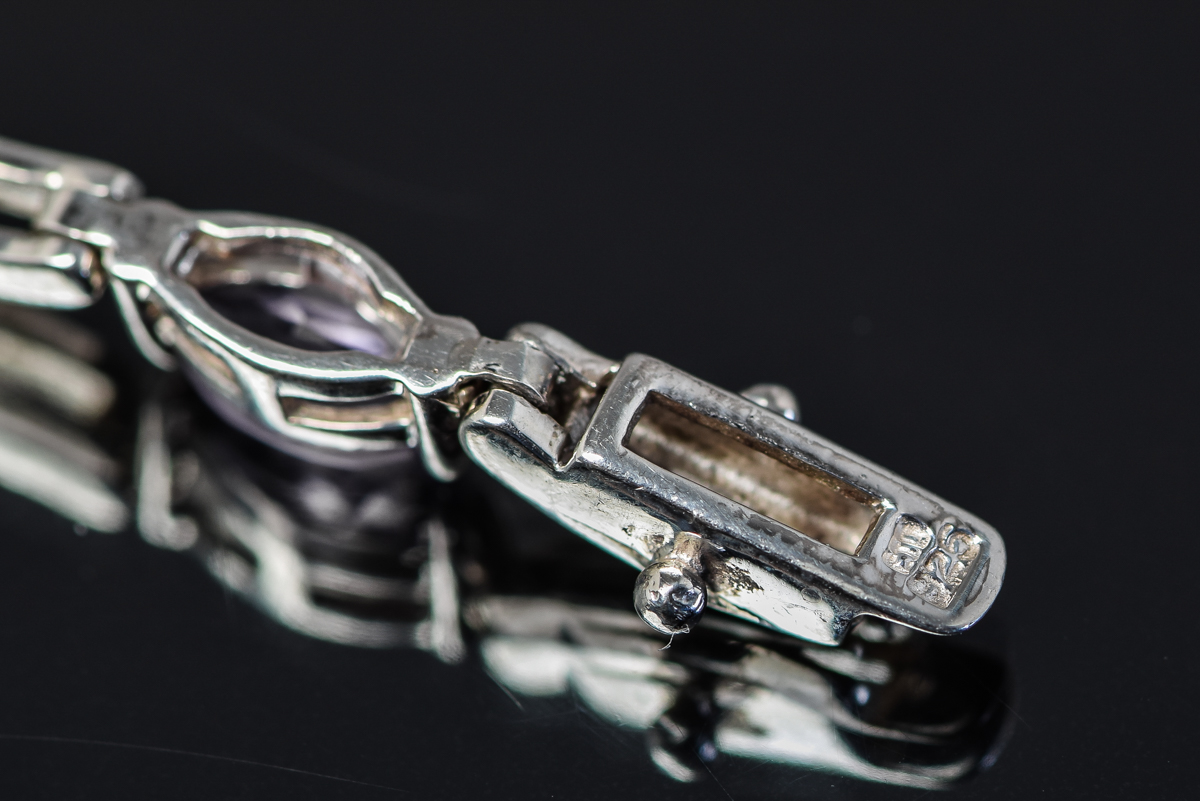 Sterling Silver and Faceted Purple Stone Bracelet