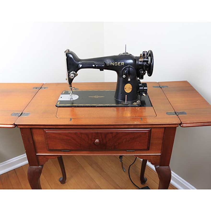 Antique Singer Sewing Machine with Modern Cabinet