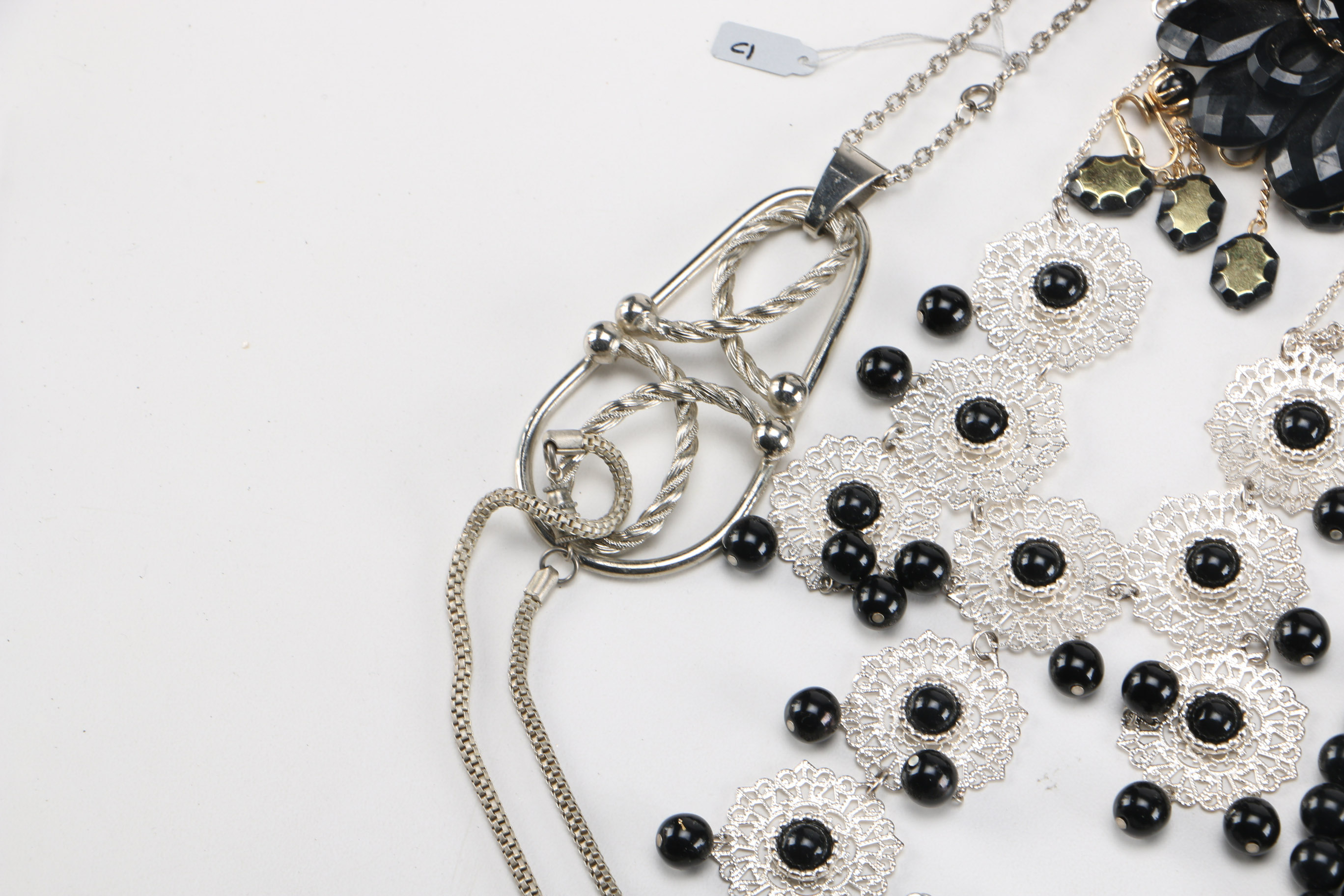 Collection of Black and Silver Tone Costume Jewelry