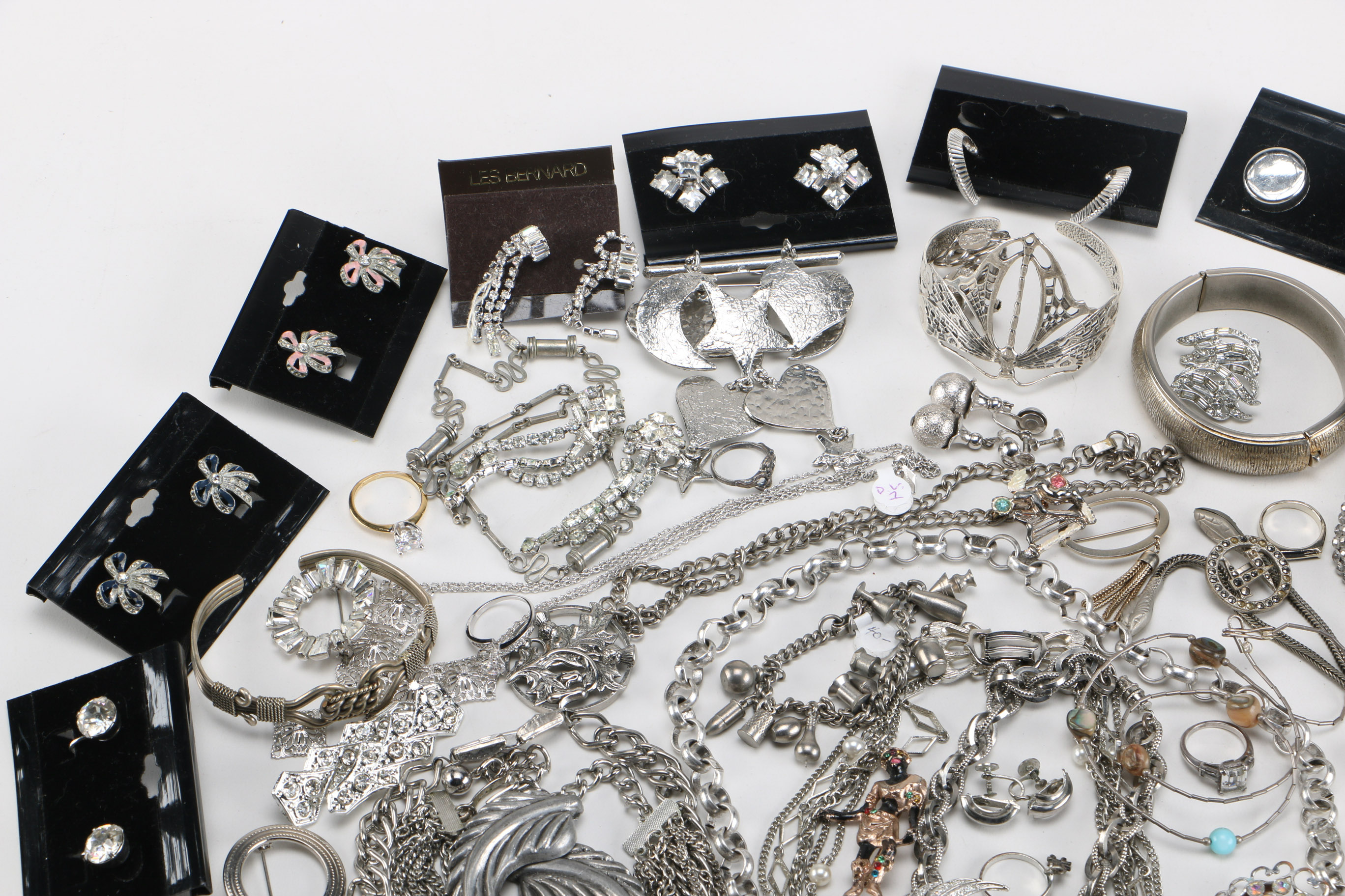 Assortment of Silver Tone and Gold Tone Costume Jewelry