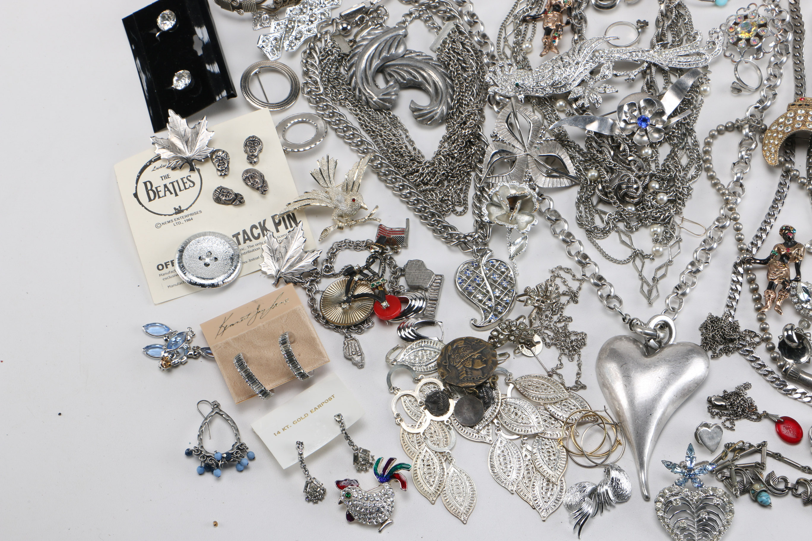 Assortment of Silver Tone and Gold Tone Costume Jewelry