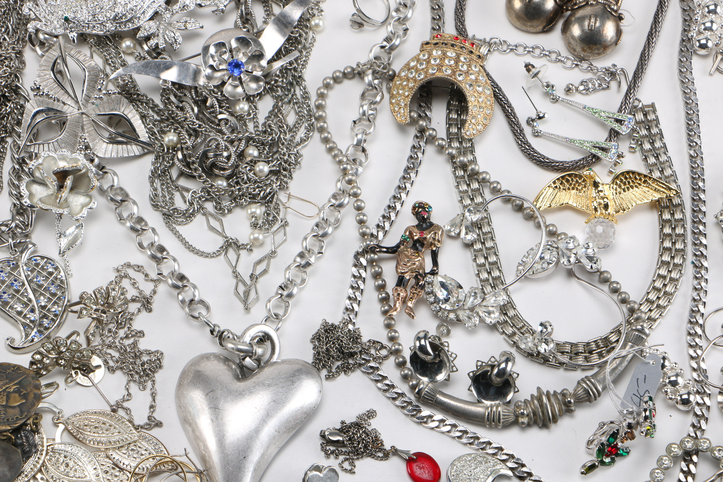 Assortment of Silver Tone and Gold Tone Costume Jewelry