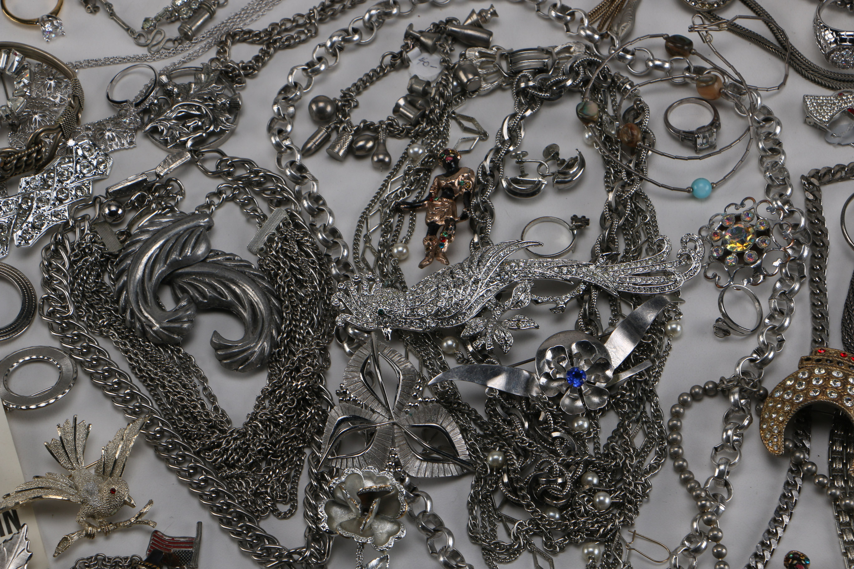 Assortment of Silver Tone and Gold Tone Costume Jewelry