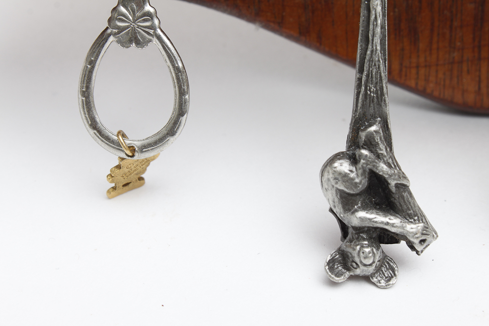 Souvenir Spoons featuring Silver Plated Rolex Bucherer on Wood Display Rack