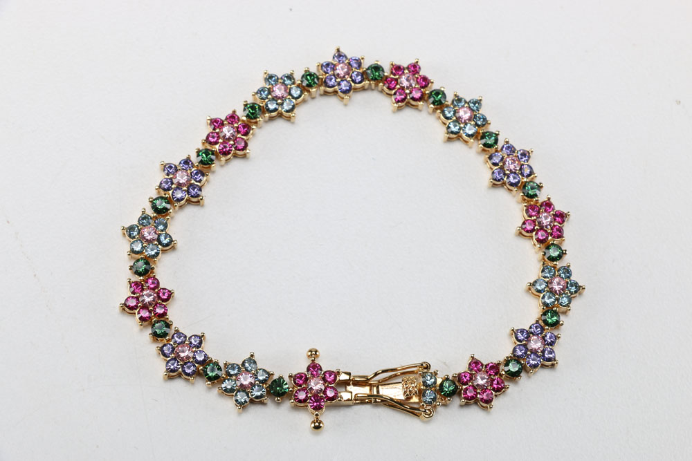 Set of Joan Rivers Rhinestone Bracelets, Earrings, and Brooches