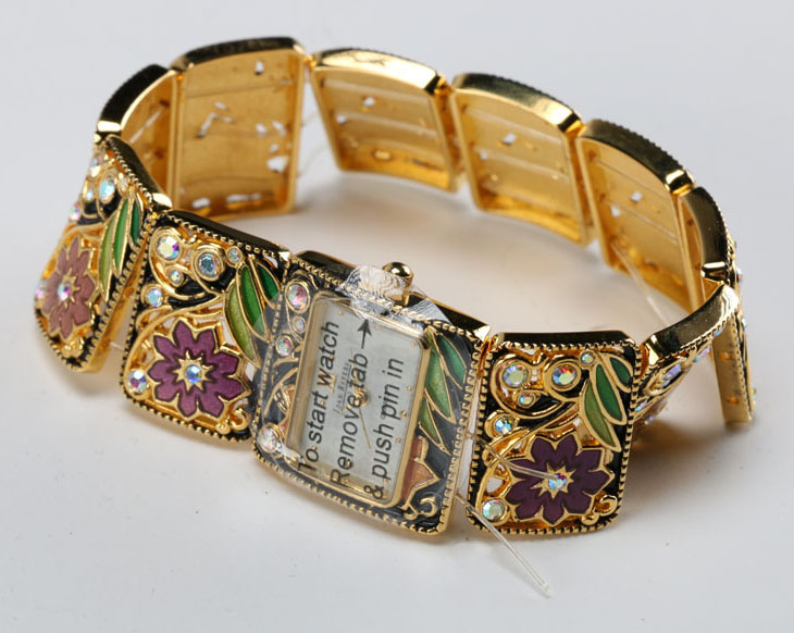 Set of Joan Rivers Jewelry with Watch, Bracelet, and Earrings