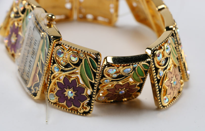 Set of Joan Rivers Jewelry with Watch, Bracelet, and Earrings