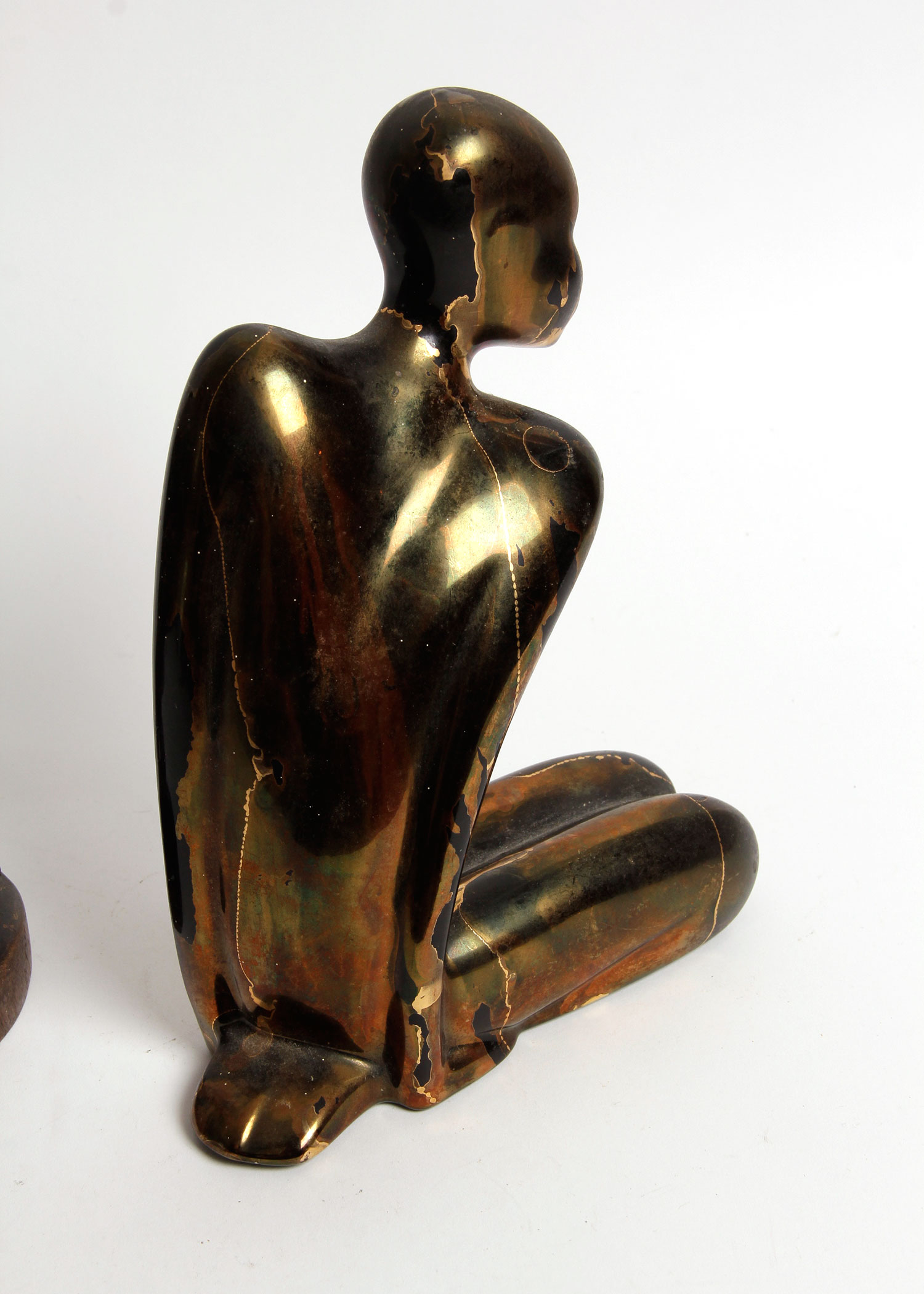 Carved Native American Figurine and Modern Statue