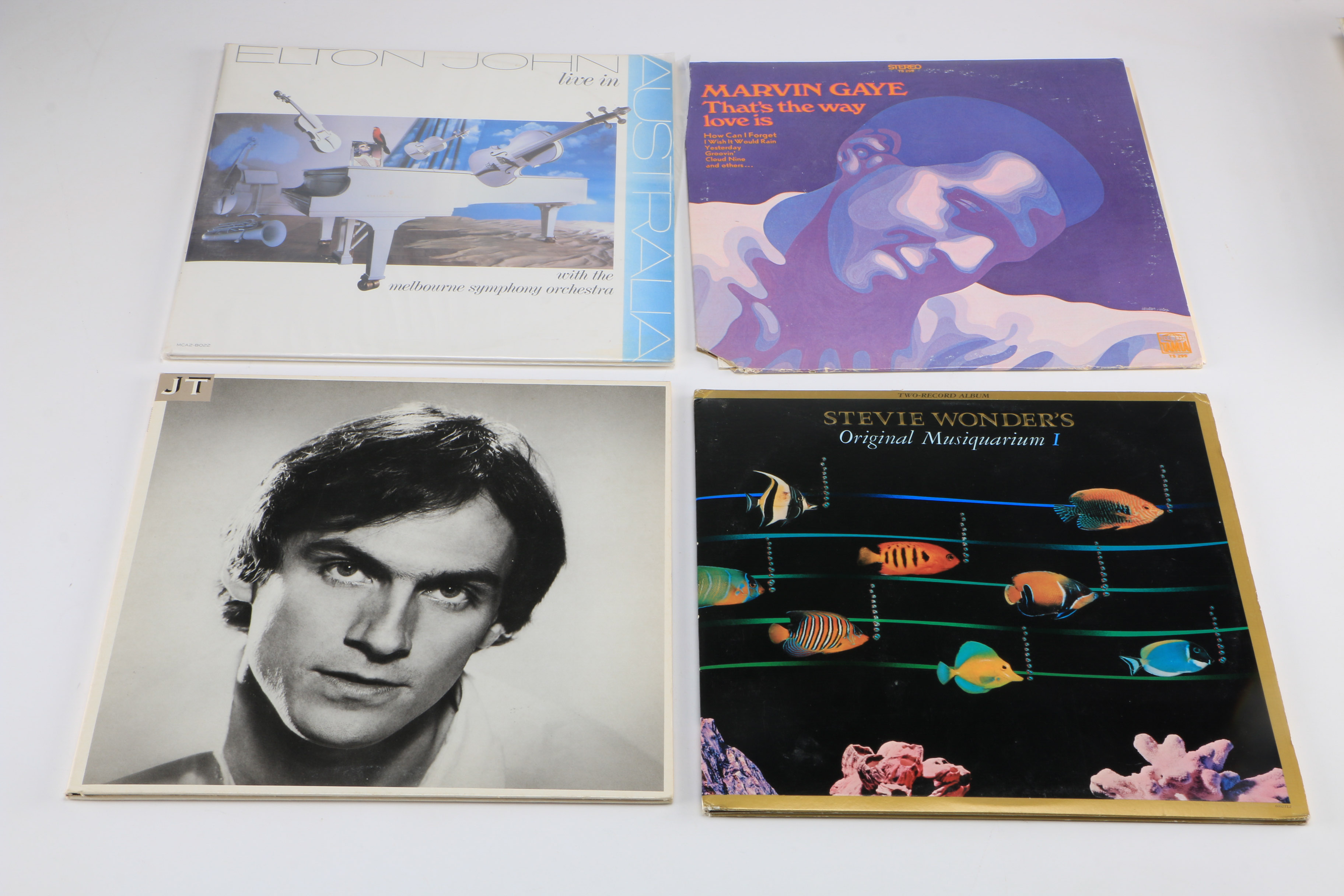 Collection of 1970s Pop Music Vinyl Records Including Elton John, Simon & Garfunkel