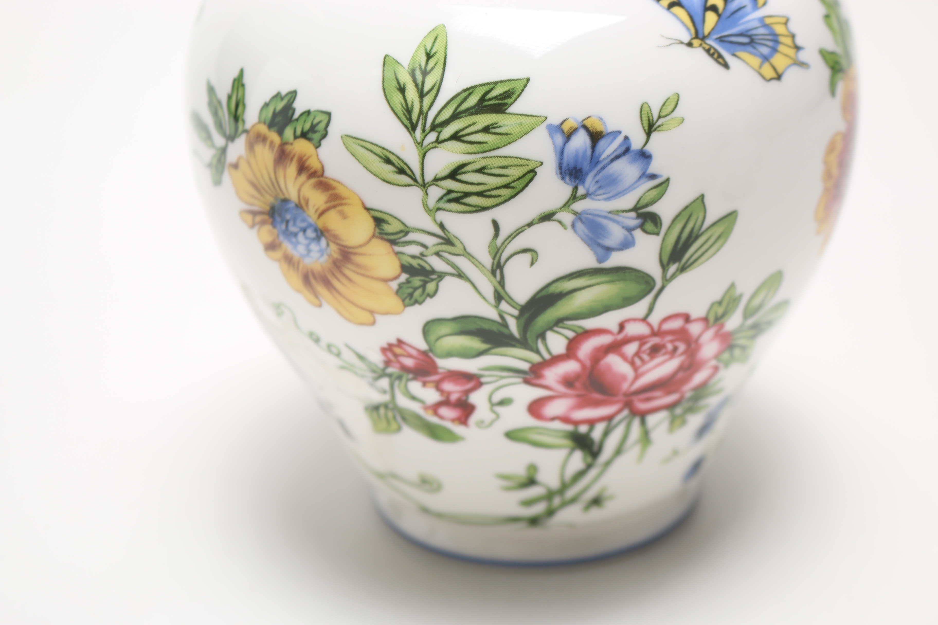 Assortment of Home Decor and Floral Vase