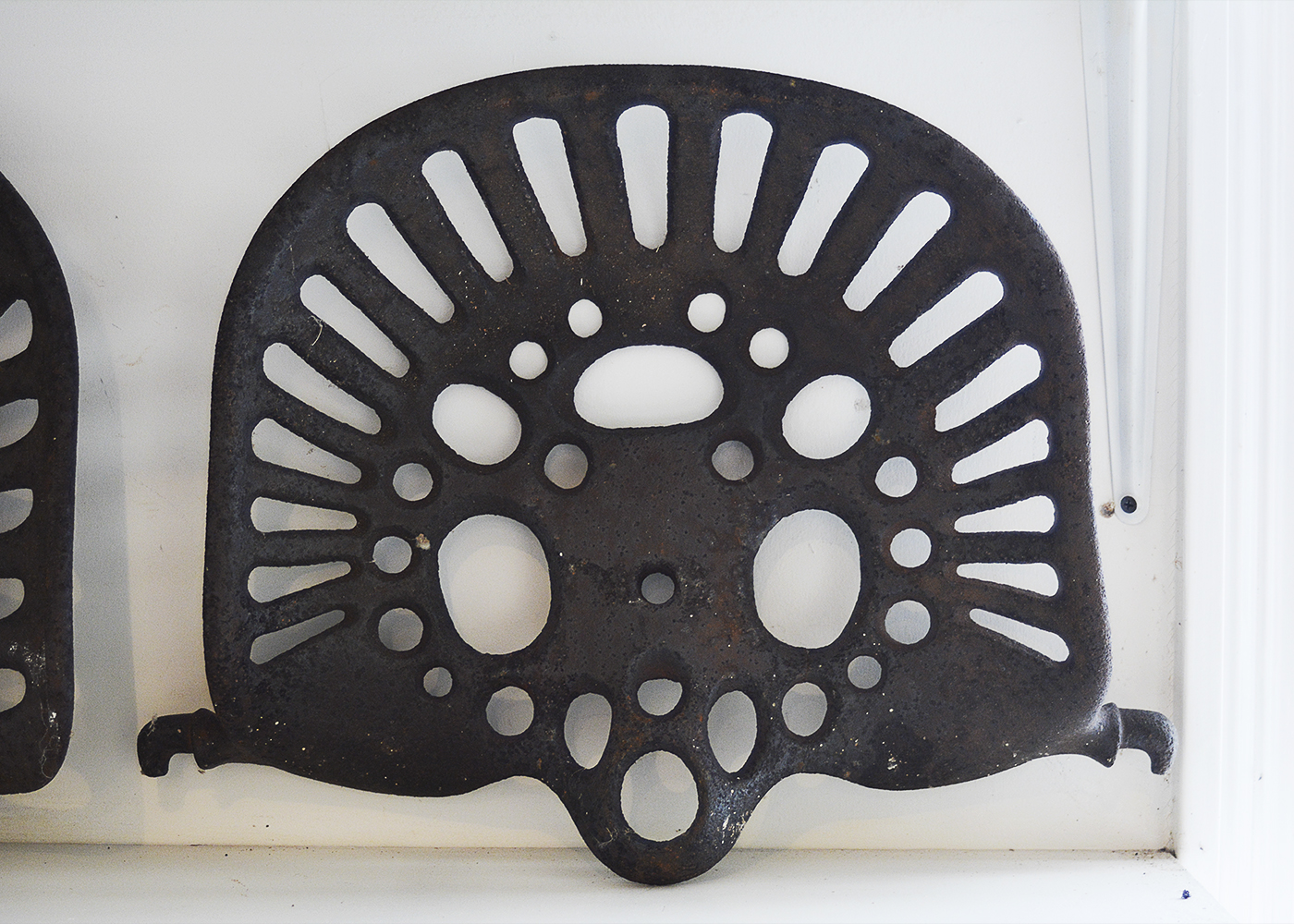 Five Vintage Cast Iron Tractor Seats