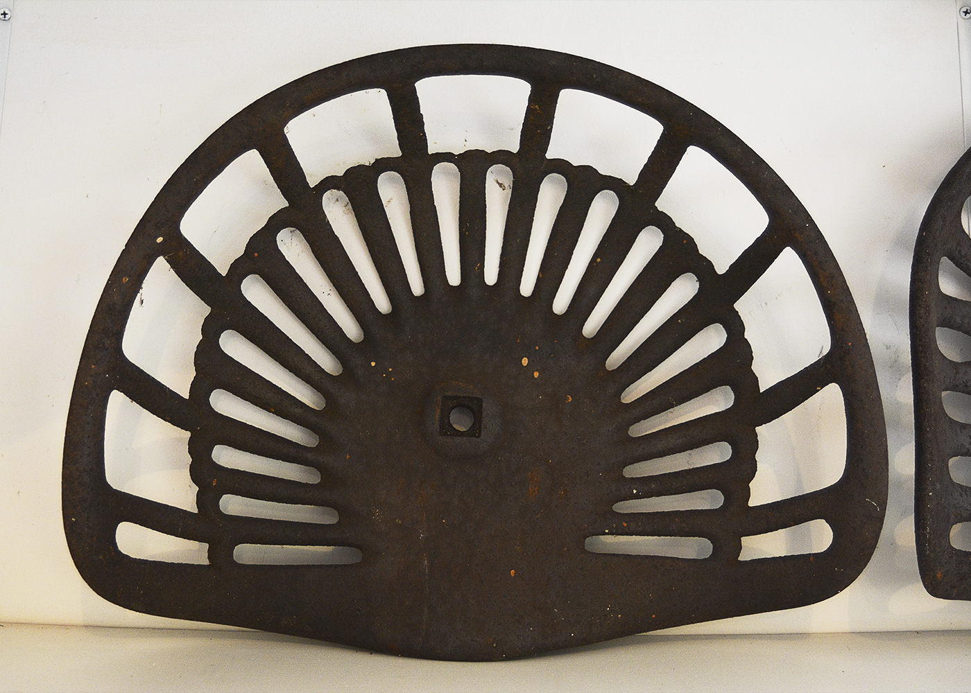 Five Vintage Cast Iron Tractor Seats