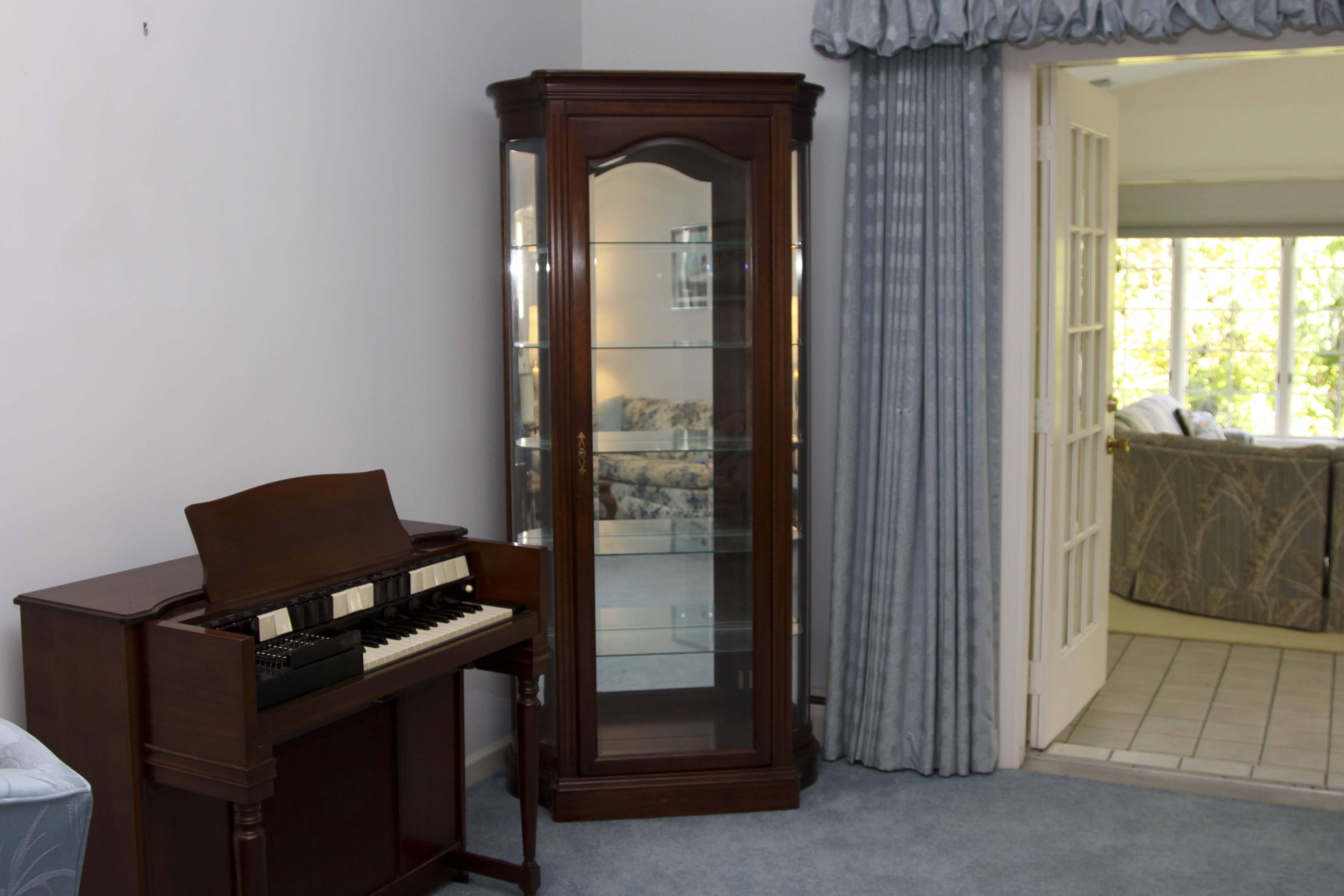 Curio Cabinet by Jasper Cabinet Company