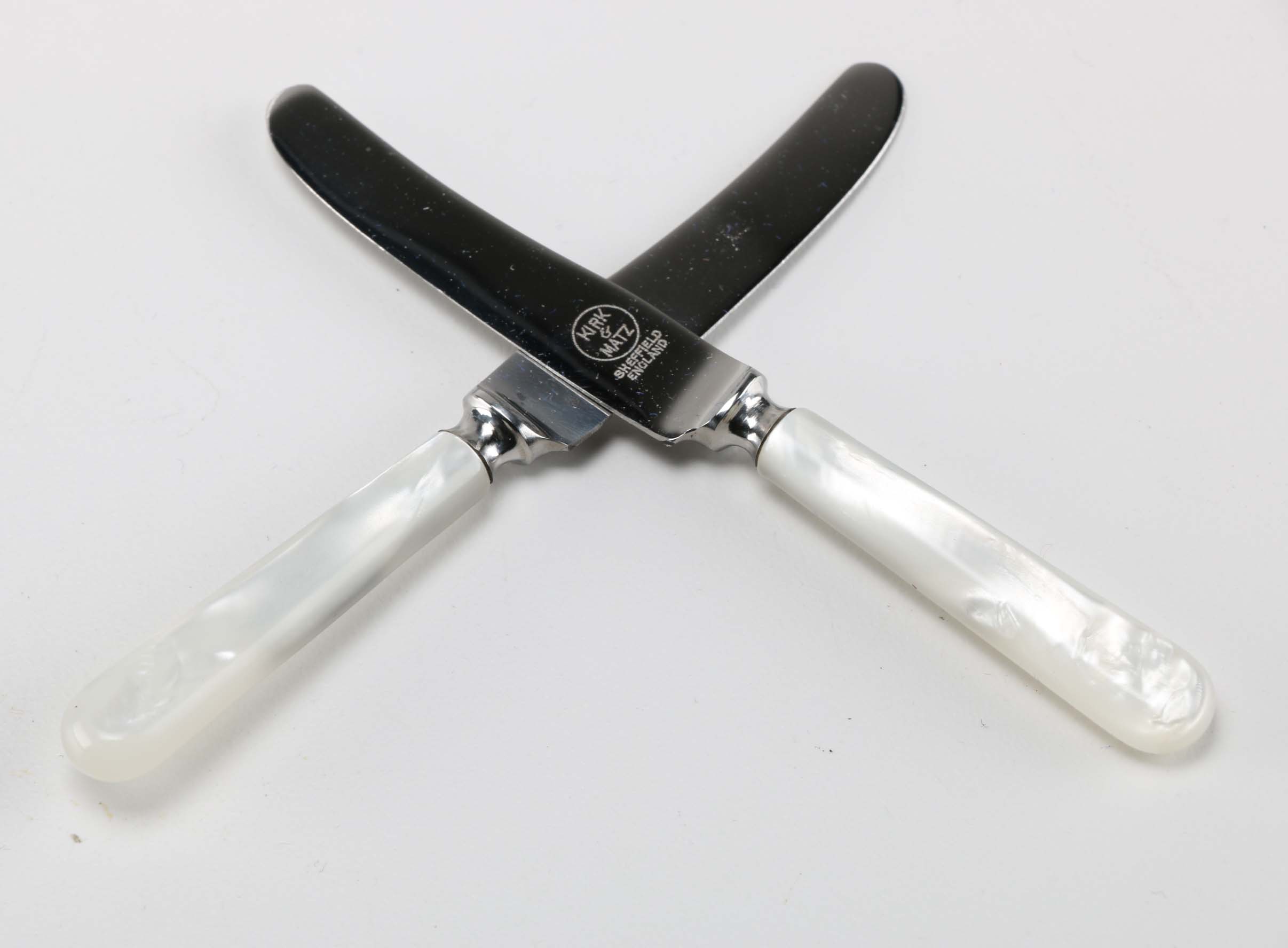 Eight Kirk & Matz Sheffield Knives with Pearlescent Handles