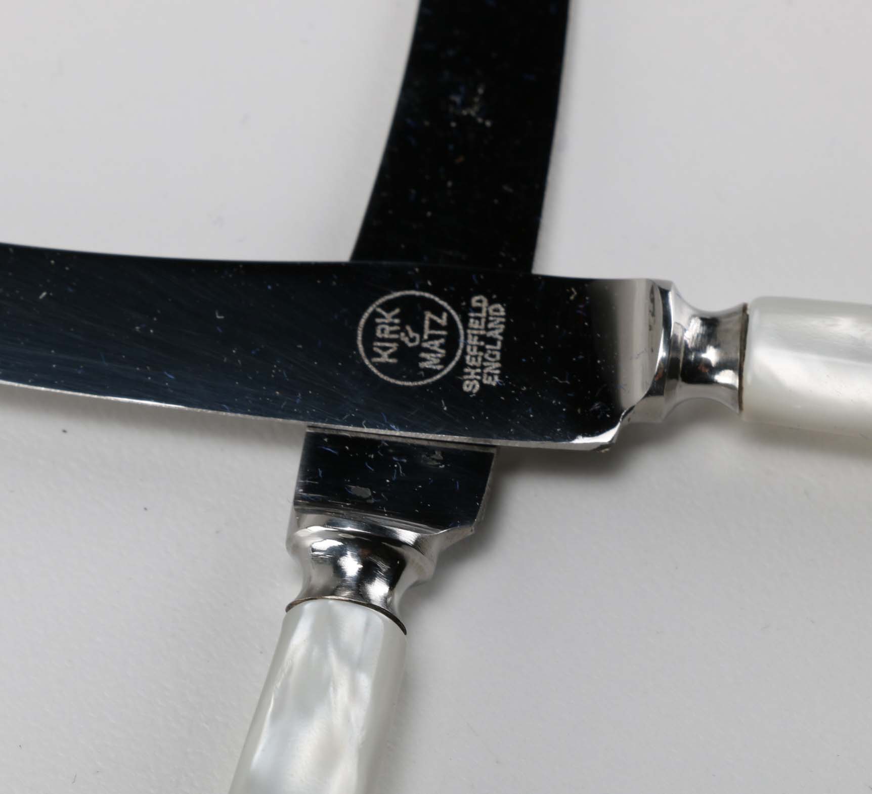 Eight Kirk & Matz Sheffield Knives with Pearlescent Handles