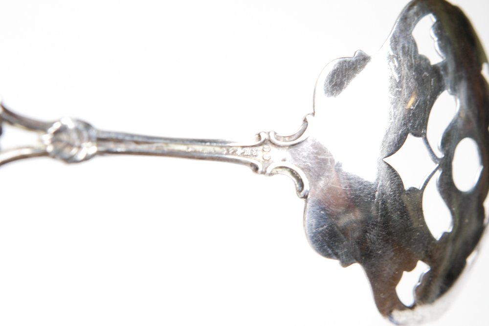 Collection of Sterling Spoons, Spreaders and a Serving Utensil