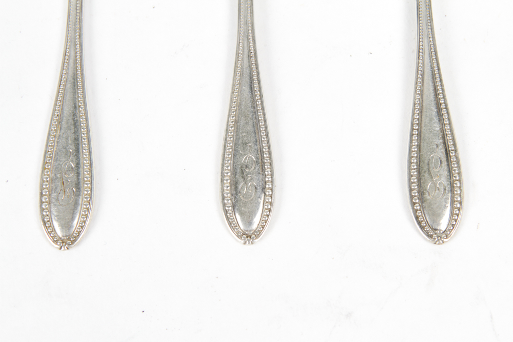 Collection of Sterling Spoons, Spreaders and a Serving Utensil