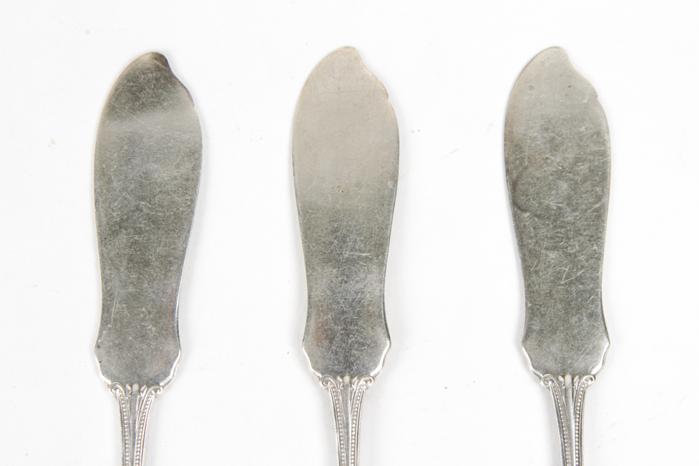 Collection of Sterling Spoons, Spreaders and a Serving Utensil