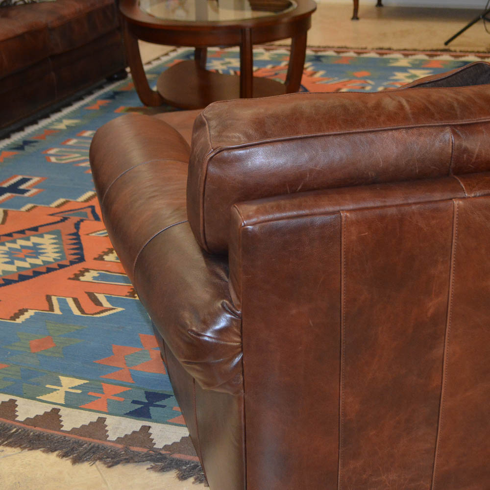 Leather Chair and Ottoman by Haverty's Furniture