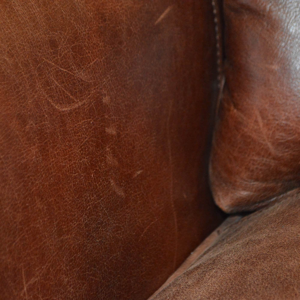 Leather Chair and Ottoman by Haverty's Furniture
