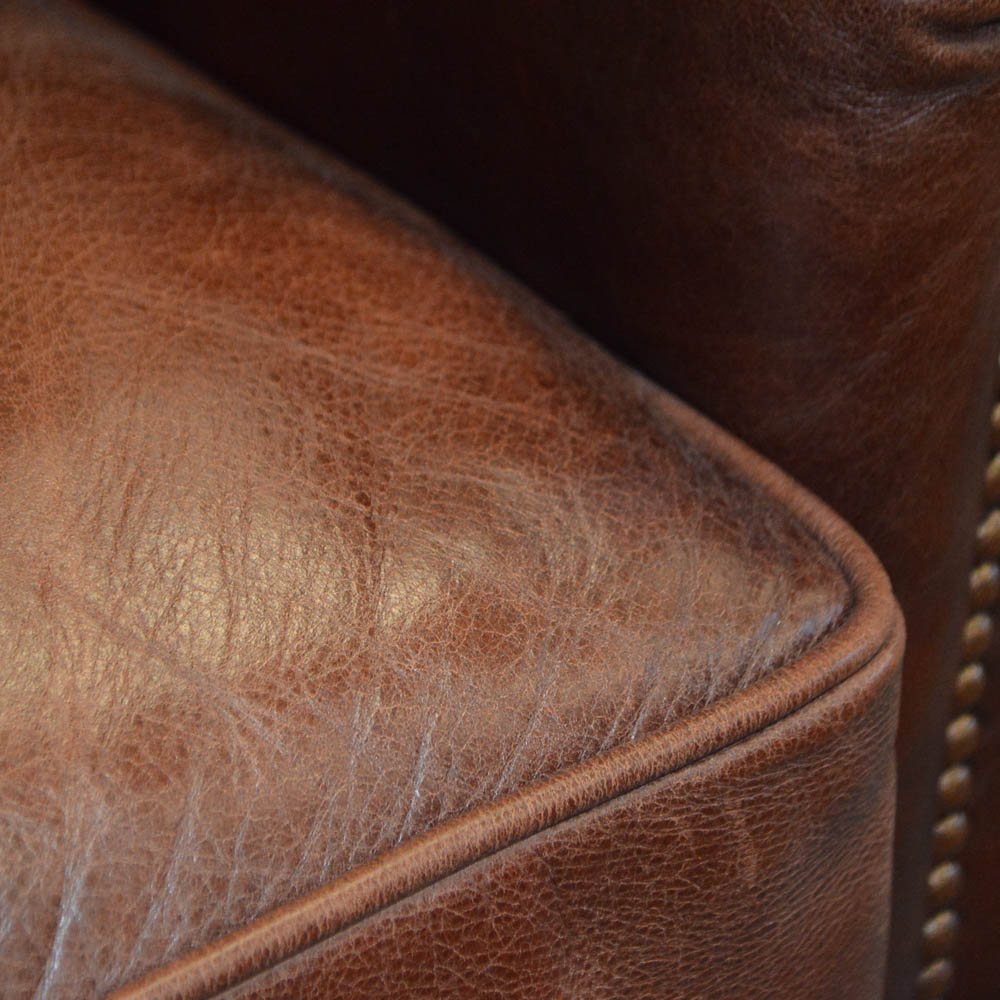 Leather Chair and Ottoman by Haverty's Furniture