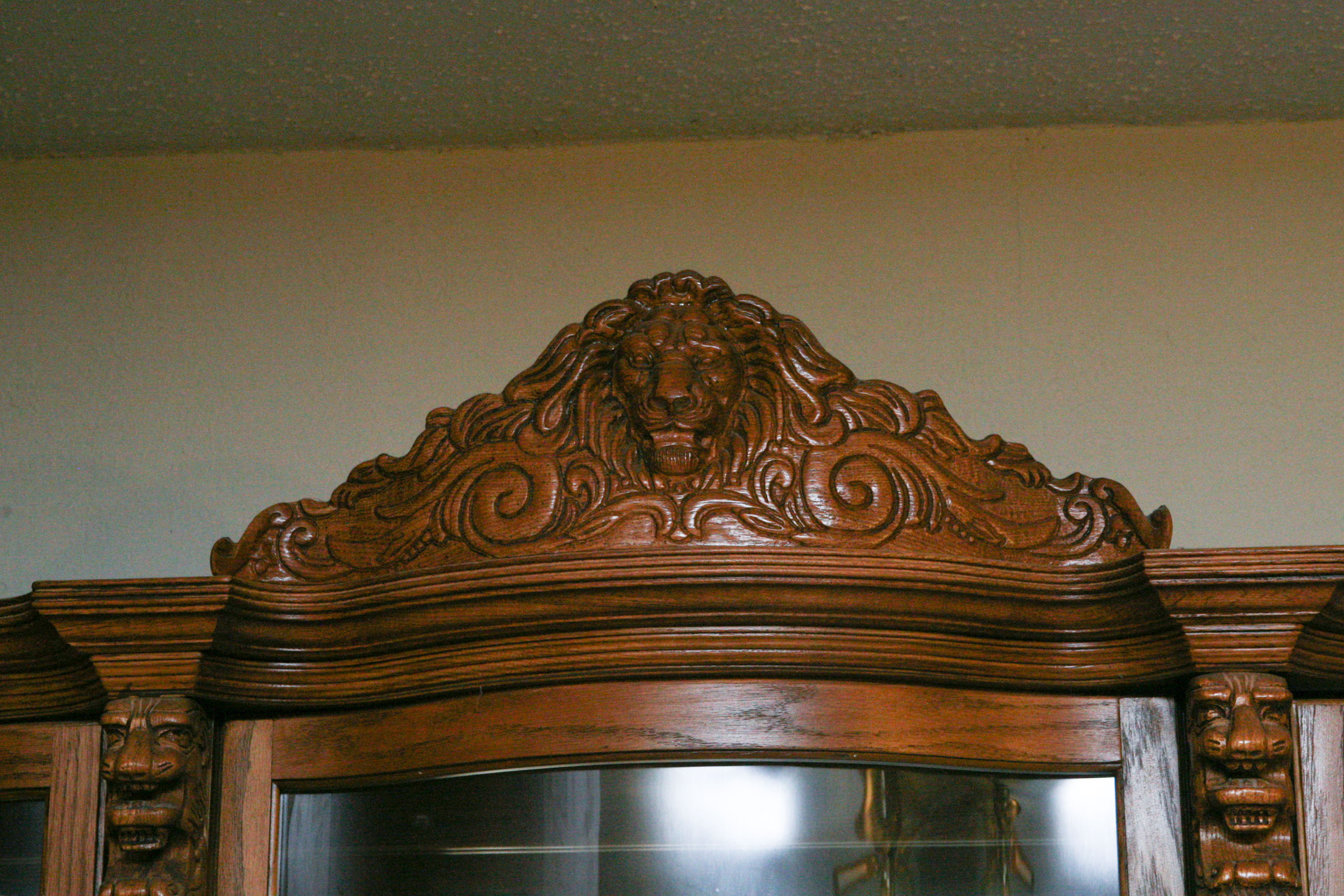 Carved Wooden Lion's Head China Cabinet