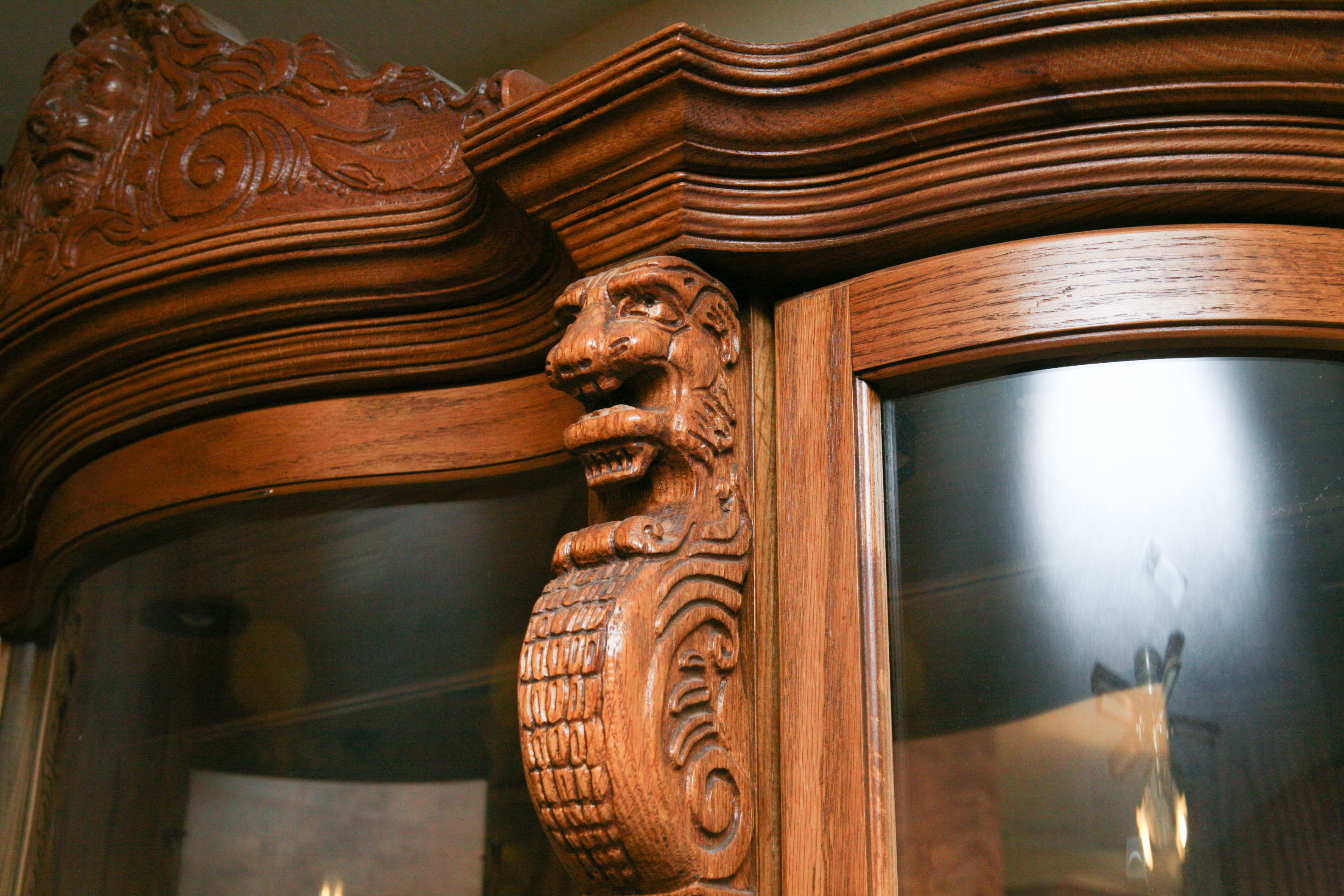 Carved Wooden Lion's Head China Cabinet