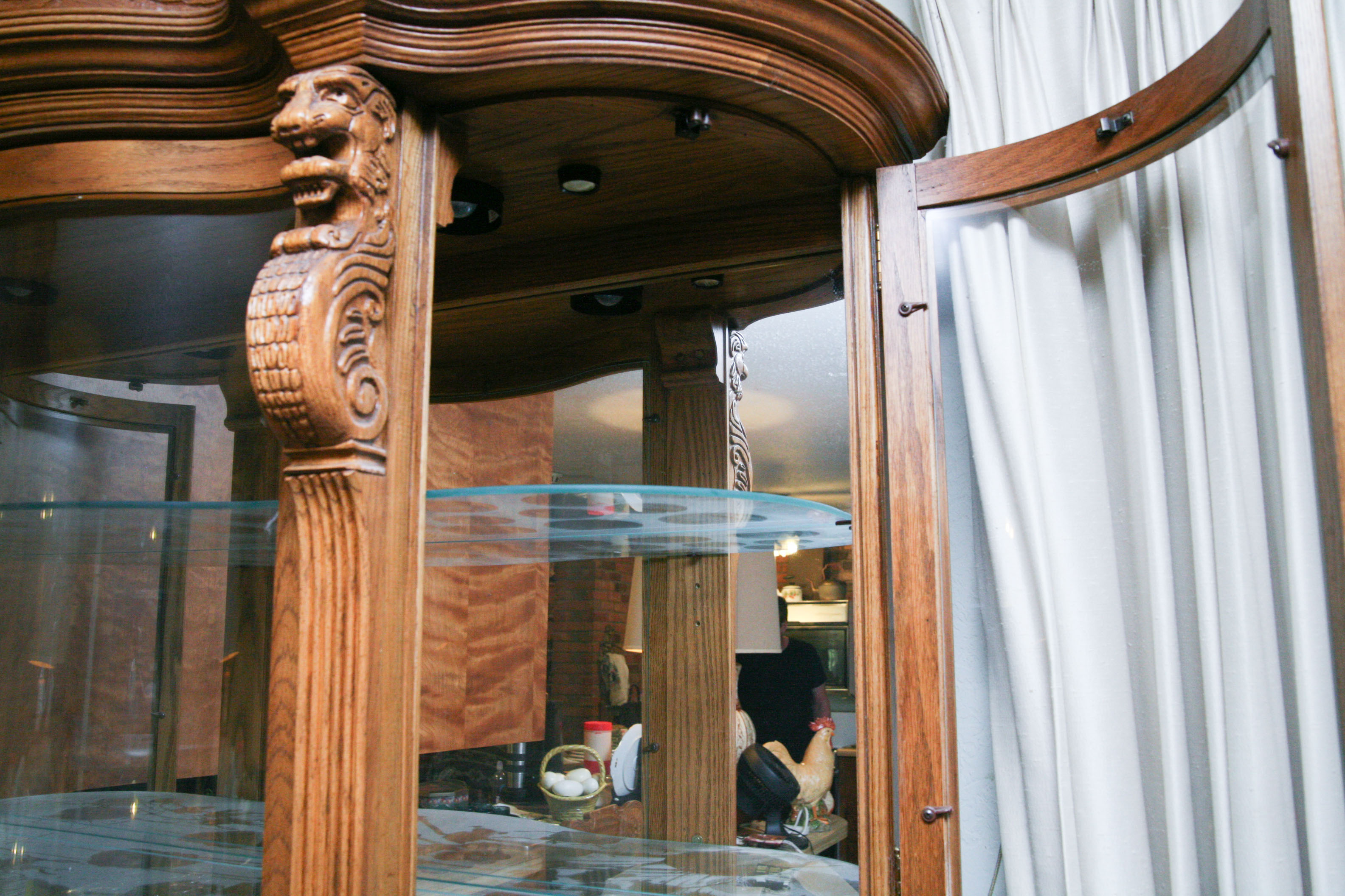 Carved Wooden Lion's Head China Cabinet