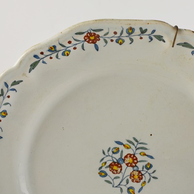 Vintage Pottery Plate With Floral Design