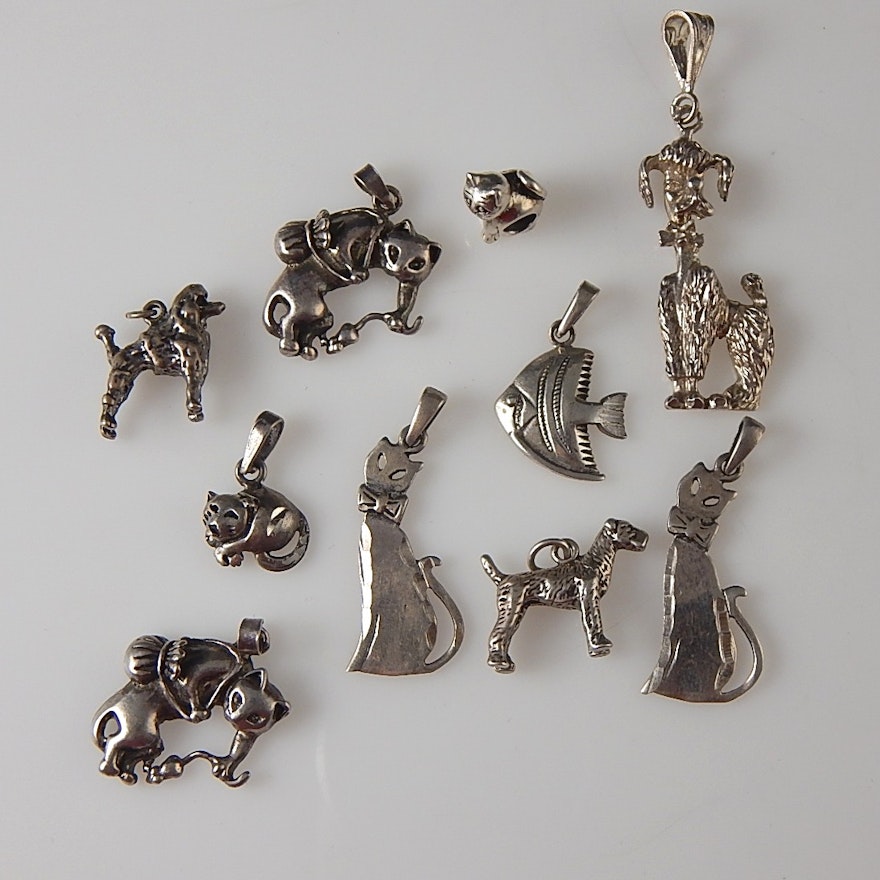 Collection of 10 - 925 Sterling Silver Charms and Pendants