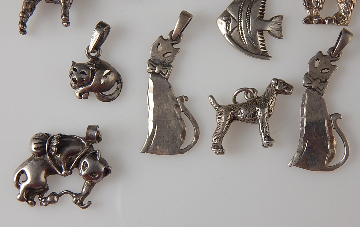 Collection of 10 - 925 Sterling Silver Charms and Pendants