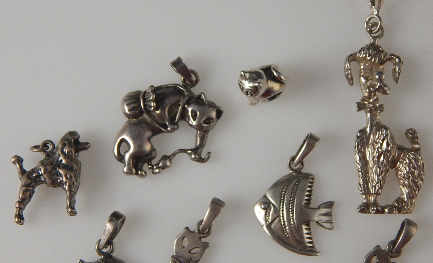 Collection of 10 - 925 Sterling Silver Charms and Pendants