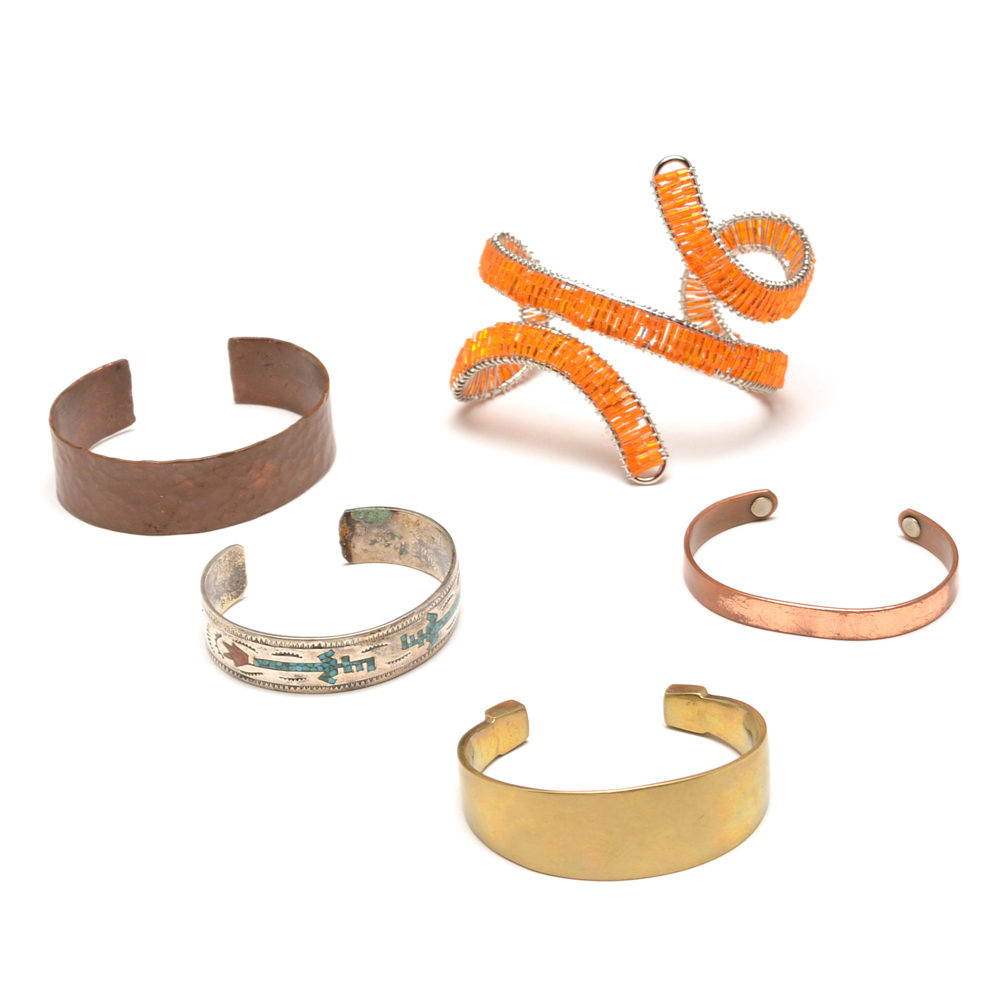 Assortment of Cuff Bracelets Including Brass and Copper