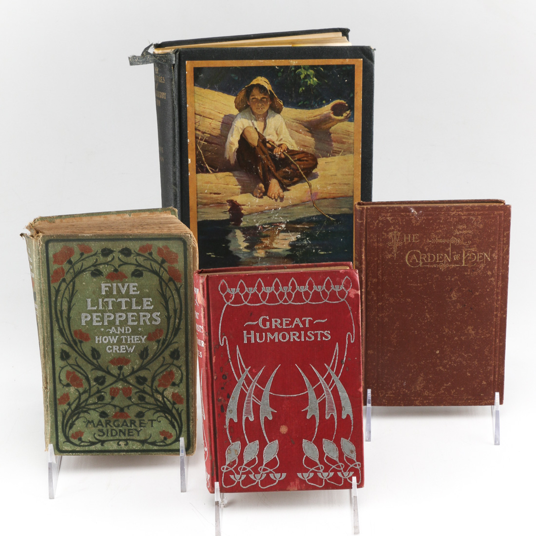 Collection of Four Vintage Books Including "Huckleberry Finn"