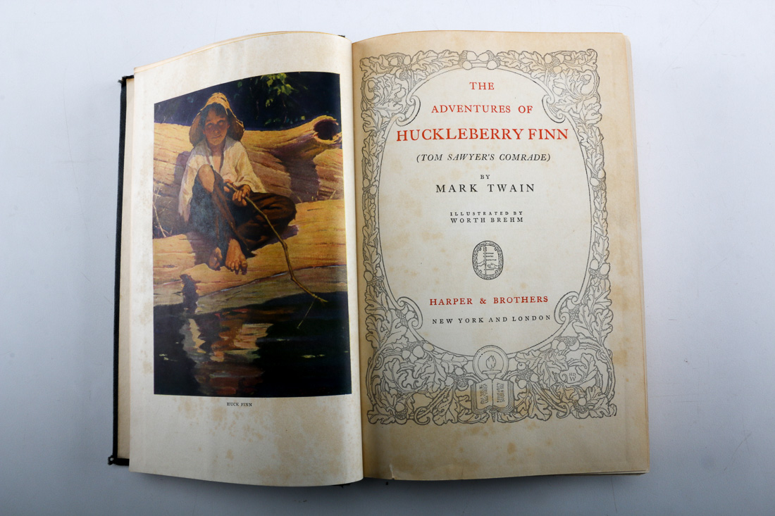 Collection of Four Vintage Books Including "Huckleberry Finn"