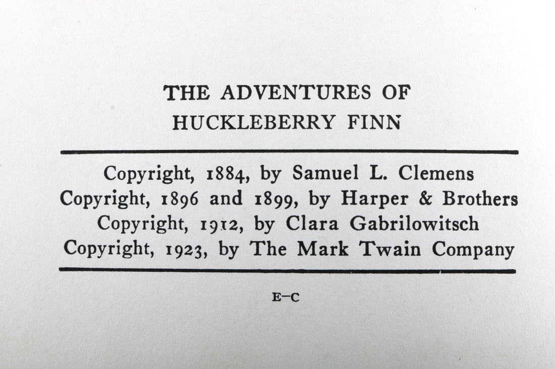 Collection of Four Vintage Books Including "Huckleberry Finn"
