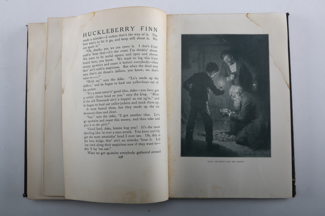 Collection of Four Vintage Books Including "Huckleberry Finn"