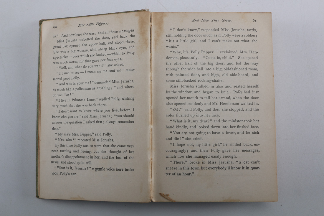 Collection of Four Vintage Books Including "Huckleberry Finn"