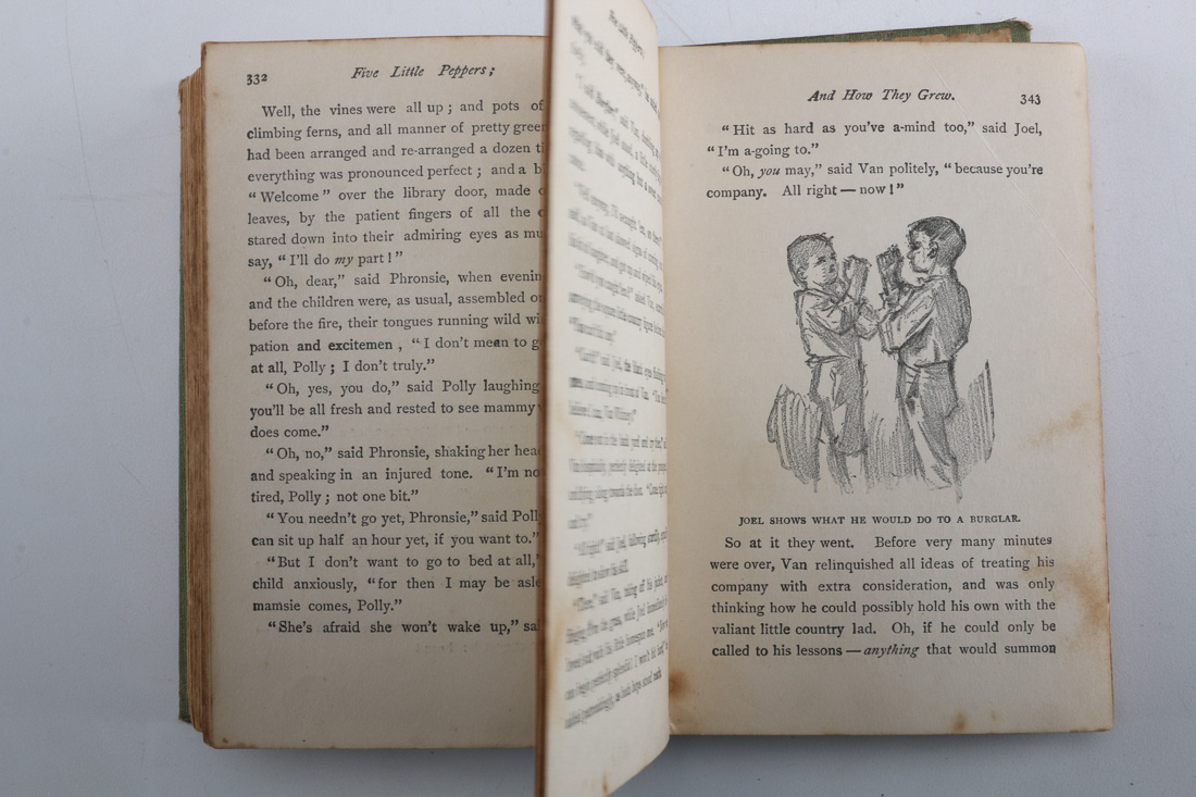 Collection of Four Vintage Books Including "Huckleberry Finn"