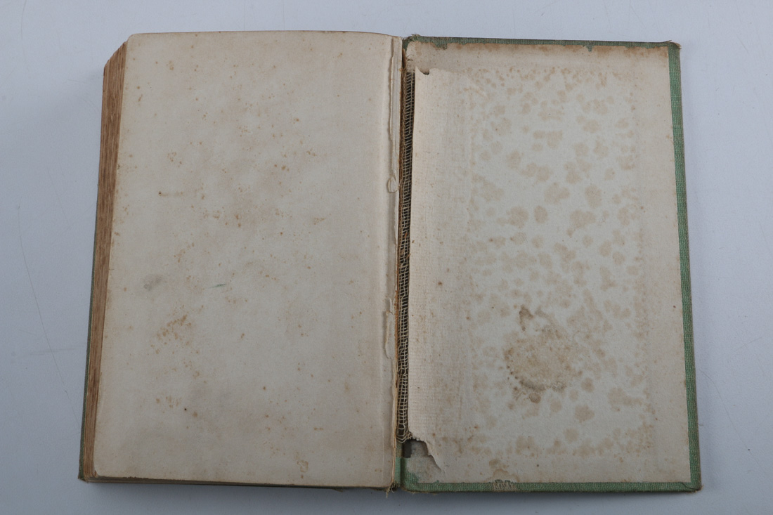 Collection of Four Vintage Books Including "Huckleberry Finn"