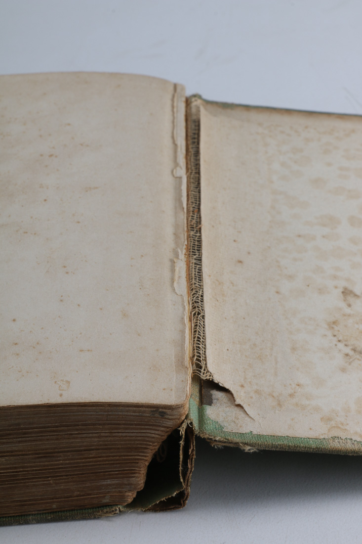 Collection of Four Vintage Books Including "Huckleberry Finn"