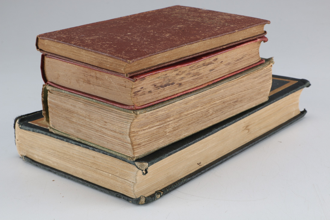 Collection of Four Vintage Books Including "Huckleberry Finn"