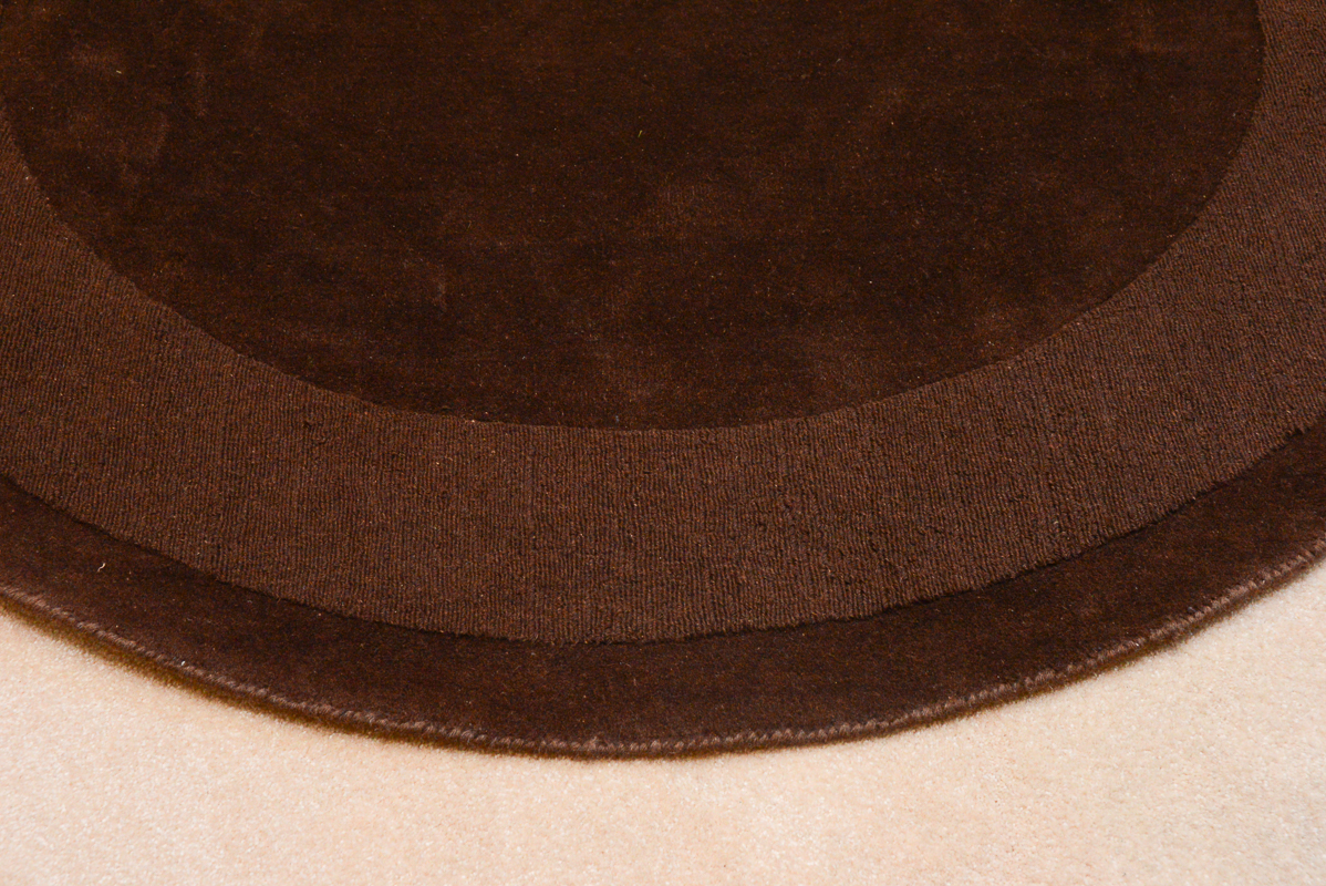 Circular Brown Machine Made Area Rug