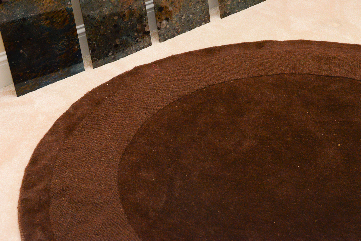 Circular Brown Machine Made Area Rug