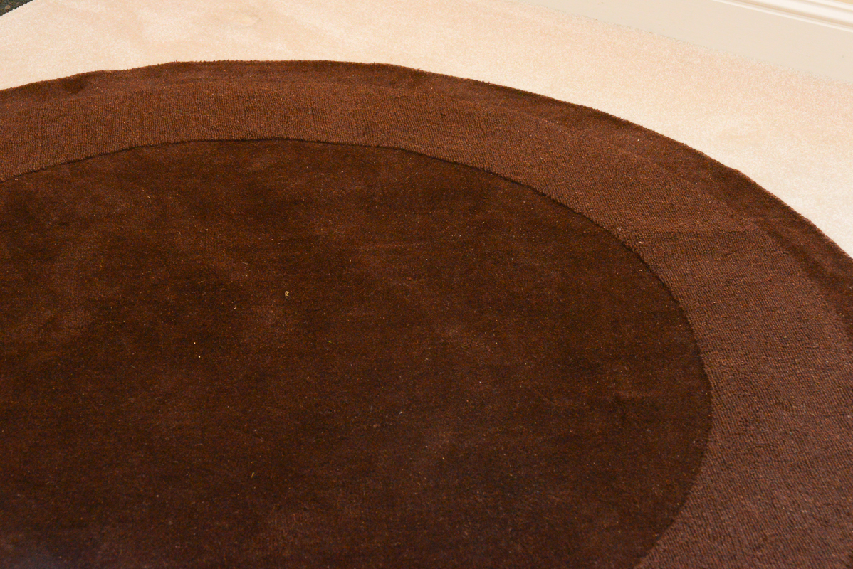 Circular Brown Machine Made Area Rug